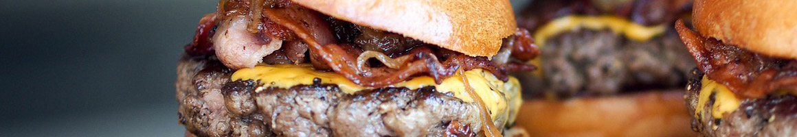 Eating Burger Gluten-Free Sandwich at Bru Burger Bar restaurant in Indianapolis, IN.